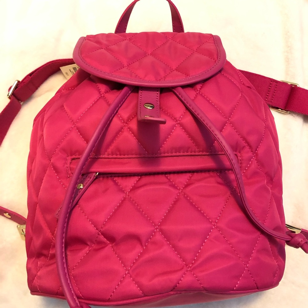 Brand new pink quilted backpack purse